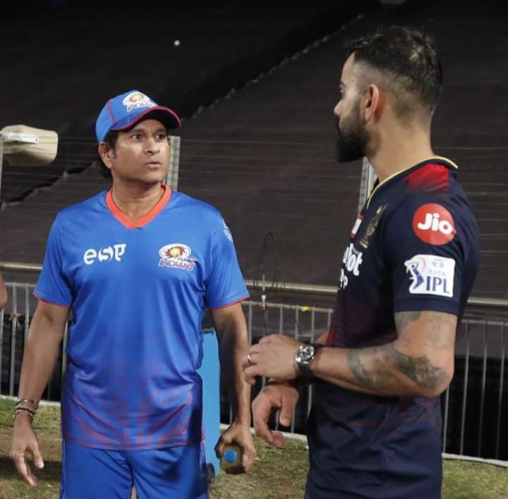 The Cricketer stands with Sachin Tendulkar