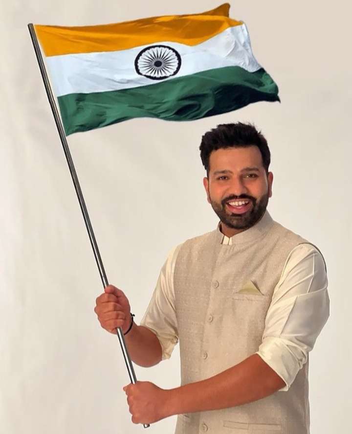 The Cricketer holding a national flag