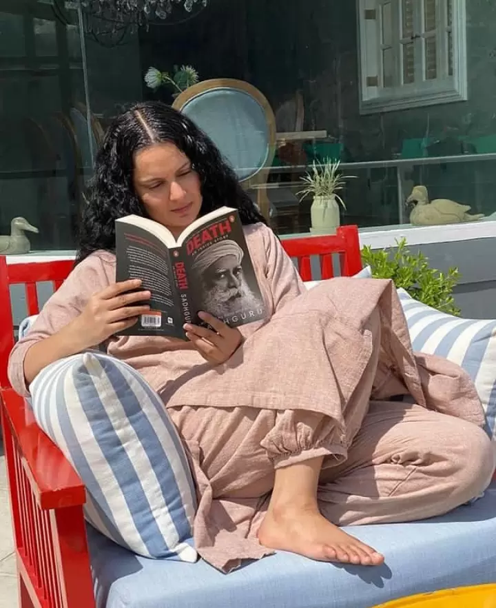 The actress reading the Book by Sadhguru